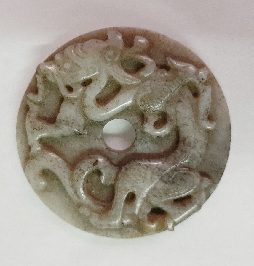 Image représentant Dragon - Disque perforé